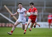 1 May 2024; Shea McCann of Derry in action against Eoin McElholm of Tyrone during the EirGrid Ulster GAA U20 Football Championship Final match between Derry and Tyrone at the Box-It Athletic Grounds in Armagh. Photo by Ben McShane/Sportsfile