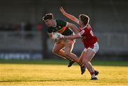 1 May 2024; Tomás Kennedy of Kerry is tackled by Darragh O’Brien of Cork during the EirGrid Munster GAA U20 Football Championship Final match between Kerry and Cork at Austin Stack Park in Tralee, Kerry. Photo by Brendan Moran/Sportsfile