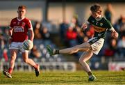 1 May 2024; Gearóid Evans of Kerry kicks a point during the EirGrid Munster GAA U20 Football Championship Final match between Kerry and Cork at Austin Stack Park in Tralee, Kerry. Photo by Brendan Moran/Sportsfile