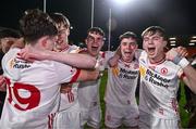 1 May 2024; Tyrone players, from left, Odhran Brolly, Ronan Cassidy and Fiachra Nelis celebrate after the EirGrid Ulster GAA U20 Football Championship Final match between Derry and Tyrone at the Box-It Athletic Grounds in Armagh. Photo by Ben McShane/Sportsfile