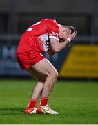 1 May 2024; Johnny McGuckian of Derry reacts after missing a penalty in the penalty shootout of the EirGrid Ulster GAA U20 Football Championship Final match between Derry and Tyrone at the Box-It Athletic Grounds in Armagh. Photo by Ben McShane/Sportsfile