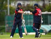 2 May 2024; Ross Adair of Northern Knights is congratulated by teammate Paul Stirling after hitting a four during the Cricket Ireland Inter-Provincial Trophy match between Munster Reds and Northern Knights at Pembroke Cricket Club in Dublin. Photo by Harry Murphy/Sportsfile