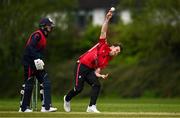 2 May 2024; Curtis Campher of Munster Reds bowls during the Cricket Ireland Inter-Provincial Trophy match between Munster Reds and Northern Knights at Pembroke Cricket Club in Dublin. Photo by Harry Murphy/Sportsfile