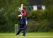2 May 2024; Paul Stirling of Northern Knights raises his bat after reaching 50 runs during the Cricket Ireland Inter-Provincial Trophy match between Munster Reds and Northern Knights at Pembroke Cricket Club in Dublin. Photo by Harry Murphy/Sportsfile