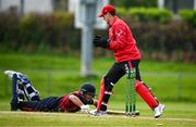 2 May 2024; Munster Reds wicketkeeper PJ Moor runs out Jake Egan of Northern Knights during the Cricket Ireland Inter-Provincial Trophy match between Munster Reds and Northern Knights at Pembroke Cricket Club in Dublin. Photo by Harry Murphy/Sportsfile