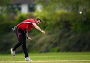 2 May 2024; Liam McCarthy of Munster Reds bowls during the Cricket Ireland Inter-Provincial Trophy match between Munster Reds and Northern Knights at Pembroke Cricket Club in Dublin. Photo by Harry Murphy/Sportsfile