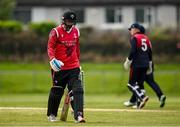2 May 2024; Brandon Kruger of Munster Reds walks off after being caught out during the Cricket Ireland Inter-Provincial Trophy match between Munster Reds and Northern Knights at Pembroke Cricket Club in Dublin. Photo by Harry Murphy/Sportsfile