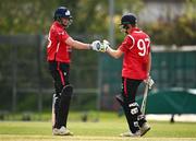 2 May 2024; Joshua Manley and John McNally of Munster Reds during the Cricket Ireland Inter-Provincial Trophy match between Munster Reds and Northern Knights at Pembroke Cricket Club in Dublin. Photo by Harry Murphy/Sportsfile