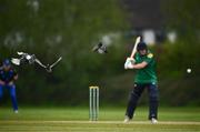 2 May 2024; Pigeons fly as Jared Wilson of North West Warriors plays a shot during the Cricket Ireland Inter-Provincial Trophy match between Leinster Lightning and North West Warriors at Pembroke Cricket Club in Dublin. Photo by Harry Murphy/Sportsfile