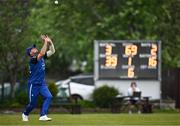 2 May 2024; Fionn Hand of Leinster Lightning catches out Jared Wilson of North West Warriors during the Cricket Ireland Inter-Provincial Trophy match between Leinster Lightning and North West Warriors at Pembroke Cricket Club in Dublin. Photo by Harry Murphy/Sportsfile