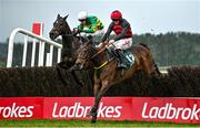 2 May 2024; Pinkerton, right, with Sam Ewing up, jumps the last on their way to winning the Frontline Security Handicap Steeplechase, from eventual second place Saint Roi, left, with Aidan Kelly up, during day three of the Punchestown Festival at Punchestown Racecourse in Kildare. Photo by Seb Daly/Sportsfile