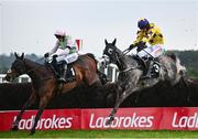 2 May 2024; Il Etait Temps, right, with Danny Mullins up, jumps the last on their way to winning the Barberstown Castle Novice Steeplechase, from eventual second place Gaelic Warrior, left, with Paul Townend up, during day three of the Punchestown Festival at Punchestown Racecourse in Kildare. Photo by Seb Daly/Sportsfile