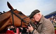 2 May 2024; Winning owner Brian Acheson kisses Teahupoo after winning the Ladbrokes Champion Stayers Hurdle during day three of the Punchestown Festival at Punchestown Racecourse in Kildare. Photo by Seb Daly/Sportsfile