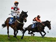 2 May 2024; Streets Of Doyen, left, with Alex Harvey up, and Subset, with Barry Stone up, jump Ruby's Double during the Mongey Communications La Touche Cup Cross Country Steeplechase on day three of the Punchestown Festival at Punchestown Racecourse in Kildare. Photo by Seb Daly/Sportsfile