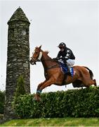 2 May 2024; Blast Of Koeman, with Sean O'Keeffe up, jumps the Glendalough Drop Hedge during the Mongey Communications La Touche Cup Cross Country Steeplechase on day three of the Punchestown Festival at Punchestown Racecourse in Kildare. Photo by Seb Daly/Sportsfile