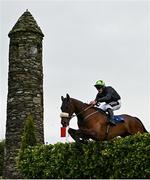 2 May 2024; El Paso Wood, with Rob James up, jumps the Glendalough Drop Hedge during the Mongey Communications La Touche Cup Cross Country Steeplechase on day three of the Punchestown Festival at Punchestown Racecourse in Kildare. Photo by Seb Daly/Sportsfile