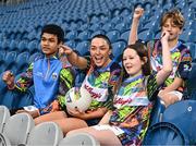 3 May 2024; In attendance at the launch of the 2024 Kellogg’s GAA Cúl Camps is Dublin ladies footballer Sinead Goldrick with pupils from St Laurence O'Tooles National School in Dublin 1, from left, Tawsif Ahamd, aged 13, Amelia Lilly Kelly, aged 10, and Makar Sviderski, aged 13, at Croke Park in Dublin. Starting at the beginning of June and running to the end of August, Kellogg’s GAA Cúl Camps are opening up a number of spots in select GAA clubs all over Ireland to children of migrant families as part of their Better Days Promise. For more information and to book now, visit www.gaa.ie/kelloggsculcamps.  Photo by Sam Barnes/Sportsfile