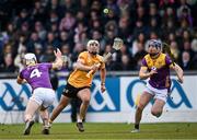 27 April 2024; Seaan Elliott of Antrim in action against, Wexford players Niall Murphy, left, and Shane Reck during the Leinster GAA Hurling Senior Championship Round 2 match between Antrim and Wexford at Corrigan Park in Belfast. Photo by Sam Barnes/Sportsfile