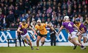 27 April 2024; Seaan Elliott of Antrim in action against, Wexford players, from left, Liam Óg McGovern, Niall Murphy and Shane Reck during the Leinster GAA Hurling Senior Championship Round 2 match between Antrim and Wexford at Corrigan Park in Belfast. Photo by Sam Barnes/Sportsfile