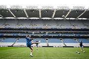 3 May 2024; Jamison Gibson-Park kicks a gaelic football during a Leinster Rugby captain's run at Croke Park in Dublin. Photo by Harry Murphy/Sportsfile