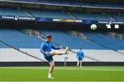 3 May 2024; Luke McGrath kicks a gaelic football during a Leinster Rugby captain's run at Croke Park in Dublin. Photo by Harry Murphy/Sportsfile