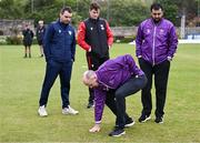 3 May 2024; Umpires Roly Black and Mohammed Waseem, right, inspect the pitch alongside team captains Andy McBrine of North West Warriors, left, and PJ Moor of Munster Reds before the Cricket Ireland Inter-Provincial Trophy match between North West Warriors and Munster Reds at Pembroke Cricket Club in Dublin. Photo by Piaras Ó Mídheach/Sportsfile