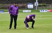 3 May 2024; Umpires Mohammed Waseem, left, and Roly Black inspect the pitch before the Cricket Ireland Inter-Provincial Trophy match between North West Warriors and Munster Reds at Pembroke Cricket Club in Dublin. Photo by Piaras Ó Mídheach/Sportsfile