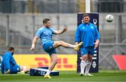 3 May 2024; Jordan Larmour kicks a gaelic football during a Leinster Rugby captain's run at Croke Park in Dublin. Photo by Harry Murphy/Sportsfile