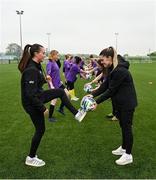 3 May 2024; The FAI Cadbury Kick Fit programme was launched today inviting women from around Ireland, who want to have fun, improve their fitness and meet new people this summer, to take part in the FAI Cadbury Kick Fit programme, a nationwide joint initiative in partnership with the Football Association of Ireland to drive participation in women’s football. In attendance at the launch are Republic of Ireland Women’s National Team players Abbie Larkin, left, and Jamie Finn with participants at the FAI Headquarters in Abbottstown, Dublin. Photo by Brendan Moran/Sportsfile