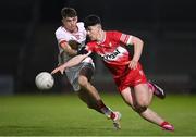 1 May 2024; Conleth McGrogan of Derry and Gavin Potter of Tyrone during the EirGrid Ulster GAA U20 Football Championship Final match between Derry and Tyrone at the Box-It Athletic Grounds in Armagh. Photo by Ben McShane/Sportsfile