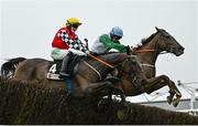 3 May 2024; Private Ryan, right, with Jamie Scallan up, jumps the last on their way to winning the Stanley Asphalt Hunters Steeplechase for the Bishopscourt Cup, from eventual second place De Nordener, left, with Toni Quail up, during day four of the Punchestown Festival at Punchestown Racecourse in Kildare. Photo by Seb Daly/Sportsfile
