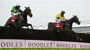 3 May 2024; Hgranca De Thaix, right, with Michael O'Sullivan up, jumps the last on their way to winning the EMS Copiers Novice Handicap Steeplechase, from eventual second place Perceval Legallois, left, with Mark Walsh up, during day four of the Punchestown Festival at Punchestown Racecourse in Kildare. Photo by Seb Daly/Sportsfile