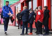 3 May 2024; Adam Foley of Drogheda United with St Patrick's Athletic supporters before the SSE Airtricity Men's Premier Division match between St Patrick's Athletic and Drogheda United at Richmond Park in Dublin. Photo by Shauna Clinton/Sportsfile