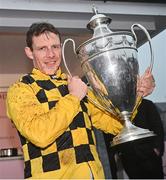 3 May 2024; Jockey Paul Townend with the trophy after winning the Boodles Champion Hurdle on State Man during day four of the Punchestown Festival at Punchestown Racecourse in Kildare. Photo by Seb Daly/Sportsfile