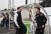 3 May 2024; Athlone Town women's manager and LOITV commentator Ciaran Kilduff, left, in conversation with Dundalk head of football operations Brian Gartland before the SSE Airtricity Men's Premier Division match between Dundalk and Shelbourne at Oriel Park in Dundalk, Louth. Photo by Ben McShane/Sportsfile