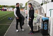 3 May 2024; Athlone Town women's manager and LOITV commentator Ciaran Kilduff, left, in conversation with Dundalk head of football operations Brian Gartland before the SSE Airtricity Men's Premier Division match between Dundalk and Shelbourne at Oriel Park in Dundalk, Louth. Photo by Ben McShane/Sportsfile