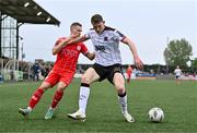 3 May 2024; Zak Bradshaw of Dundalk in action against Liam Burt of Shelbourne during the SSE Airtricity Men's Premier Division match between Dundalk and Shelbourne at Oriel Park in Dundalk, Louth. Photo by Ben McShane/Sportsfile