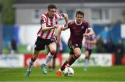 3 May 2024; Daniel Kelly of Derry City in action against Regan Donelon of Galway United during the SSE Airtricity Men's Premier Division match between Galway United and Derry City at Eamonn Deacy Park in Galway. Photo by Tom Beary/Sportsfile