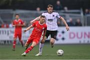 3 May 2024; Liam Burt of Shelbourne in action against Zak Bradshaw of Dundalk during the SSE Airtricity Men's Premier Division match between Dundalk and Shelbourne at Oriel Park in Dundalk, Louth. Photo by Ben McShane/Sportsfile
