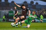 3 May 2024; James Clarke of Bohemians is tackled by Darragh Nugent of Shamrock Rovers during the SSE Airtricity Men's Premier Division match between Bohemians and Shamrock Rovers at Dalymount Park in Dublin. Photo by Brendan Moran/Sportsfile
