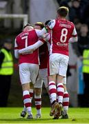 3 May 2024; Ruairi Keating of St Patrick's Athletic, 7, celebrates with team-mates, including Chris Forrester, right, after scoring his side's first goal during the SSE Airtricity Men's Premier Division match between St Patrick's Athletic and Drogheda United at Richmond Park in Dublin. Photo by Shauna Clinton/Sportsfile