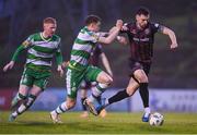 3 May 2024; Jordan Flores of Bohemians in action against Markus Poom and Darragh Nugent, left, of Shamrock Rovers during the SSE Airtricity Men's Premier Division match between Bohemians and Shamrock Rovers at Dalymount Park in Dublin. Photo by Stephen McCarthy/Sportsfile