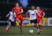 3 May 2024; Robbie Benson of Dundalk and John Martin of Shelbourne during the SSE Airtricity Men's Premier Division match between Dundalk and Shelbourne at Oriel Park in Dundalk, Louth. Photo by Ben McShane/Sportsfile