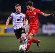3 May 2024; Tyreke Wilson of Shelbourne in action against Daryl Horgan of Dundalk during the SSE Airtricity Men's Premier Division match between Dundalk and Shelbourne at Oriel Park in Dundalk, Louth. Photo by Ben McShane/Sportsfile