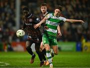 3 May 2024; Aboubacar Keita of Bohemians in action against Johnny Kenny of Shamrock Rovers during the SSE Airtricity Men's Premier Division match between Bohemians and Shamrock Rovers at Dalymount Park in Dublin. Photo by Brendan Moran/Sportsfile