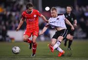 3 May 2024; Daryl Horgan of Dundalk has a shot on goal despite the attention of Tyreke Wilson of Shelbourne during the SSE Airtricity Men's Premier Division match between Dundalk and Shelbourne at Oriel Park in Dundalk, Louth. Photo by Ben McShane/Sportsfile