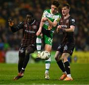3 May 2024; Johnny Kenny of Shamrock Rovers in action against Aboubacar Keita and Jevon Mills of Bohemians during the SSE Airtricity Men's Premier Division match between Bohemians and Shamrock Rovers at Dalymount Park in Dublin. Photo by Brendan Moran/Sportsfile