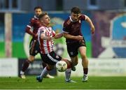 3 May 2024; Edward McCarthy of Galway United is tackled by Ronan Boyce of Derry City during the SSE Airtricity Men's Premier Division match between Galway United and Derry City at Eamonn Deacy Park in Galway. Photo by Tom Beary/Sportsfile
