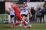 3 May 2024; John Mountney of Dundalk in action against Kameron Ledwidge of Shelbourne during the SSE Airtricity Men's Premier Division match between Dundalk and Shelbourne at Oriel Park in Dundalk, Louth. Photo by Ben McShane/Sportsfile