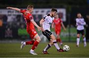 3 May 2024; Scott High of Dundalk in action against Gavin Molloy of Shelbourne during the SSE Airtricity Men's Premier Division match between Dundalk and Shelbourne at Oriel Park in Dundalk, Louth. Photo by Ben McShane/Sportsfile